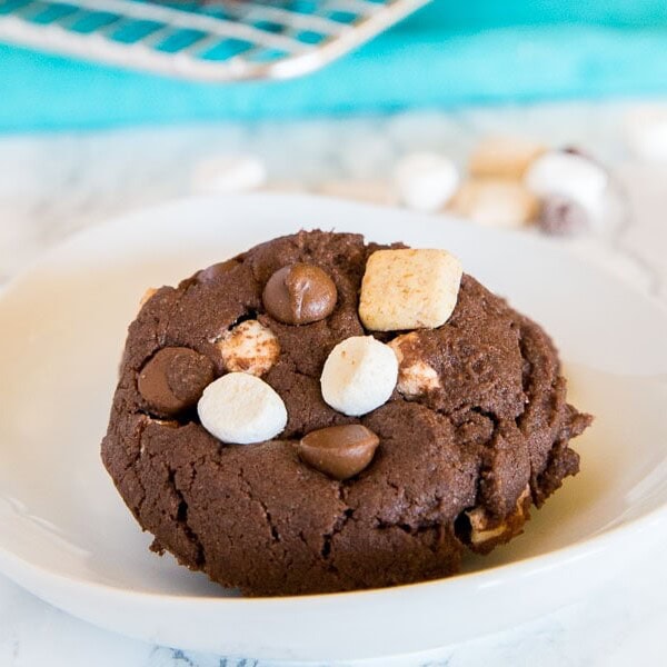 S'mores Chocolate Cake Mix Cookies - super easy cake mix cookies loaded with marshmallows, more chocolate, and graham cracker pieces. Soft, chewy, and fudgy chocolate cookie perfection!