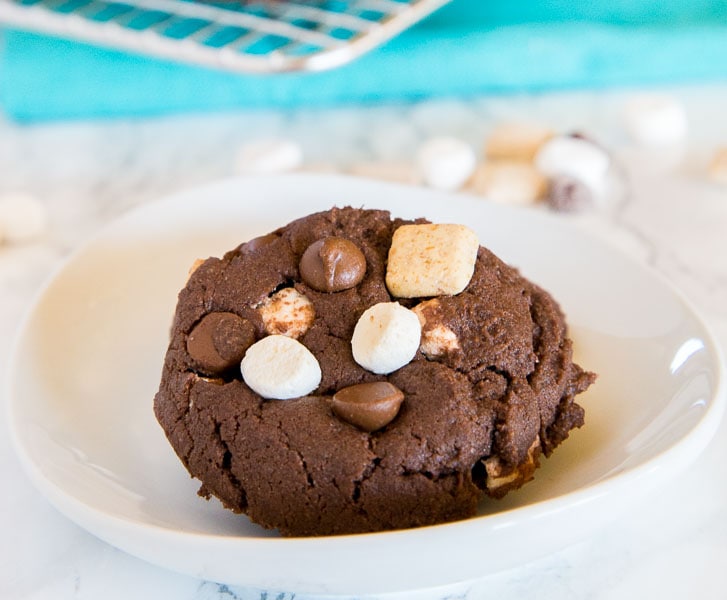 S'mores Chocolate Cake Mix Cookies - super easy cake mix cookies loaded with marshmallows, more chocolate, and graham cracker pieces. Soft, chewy, and fudgy chocolate cookie perfection!