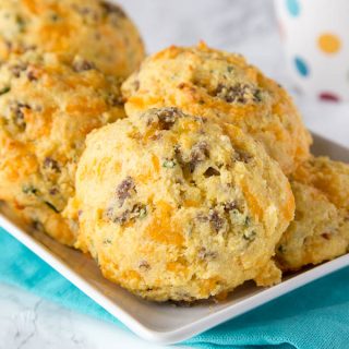 Cheese and Sausage Biscuit Recipe - light and fluffy homemade biscuits full of cheddar cheese and sausage. Great for make ahead breakfasts!
