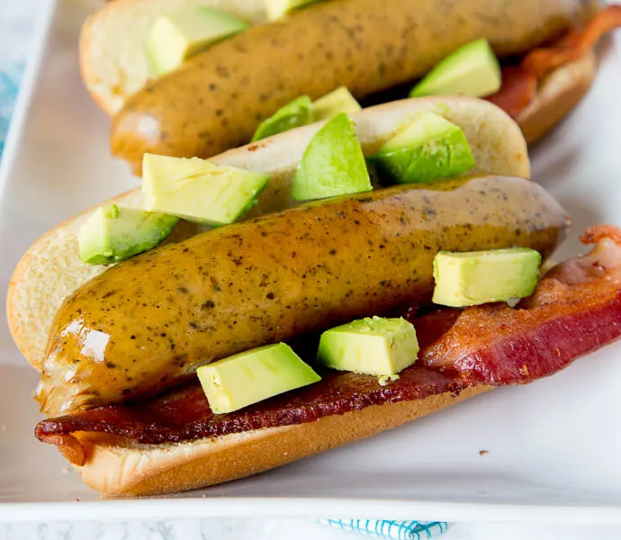 Bacon Avocado Beer Brats - Time to fire up the grill and make your brats extra special.  Add bacon and diced avocado for a delicious twist!  