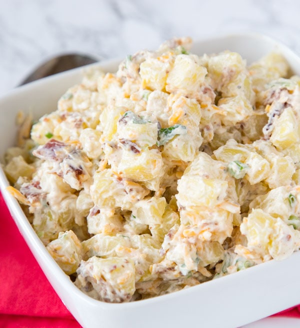 A bowl of food, with Potato and Salad