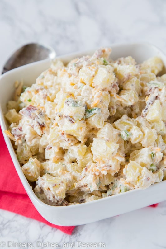 A bowl of food, with Salad and Potato salad