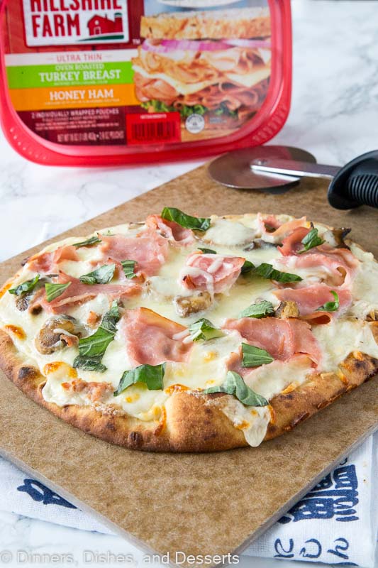 A slice of pizza sitting on top of a table