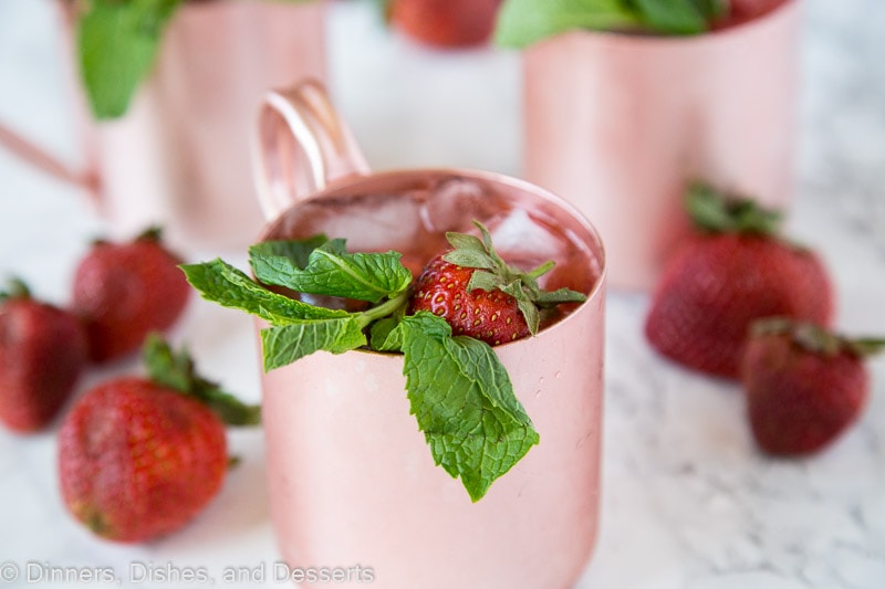 Strawberry Moscow Mule - strawberries giving a classic Moscow Mule a sweet and fun twist!  Whip these up today, they are perfect to sip on any day of the week!  