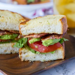 Garlic Bread BLT - use garlic bread to make your BLT over the top!  Buttery, crispy, and extra delicious!