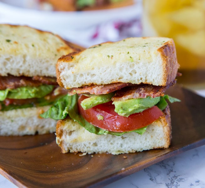 Garlic Bread BLT - use garlic bread to make your BLT over the top!  Buttery, crispy, and extra delicious!