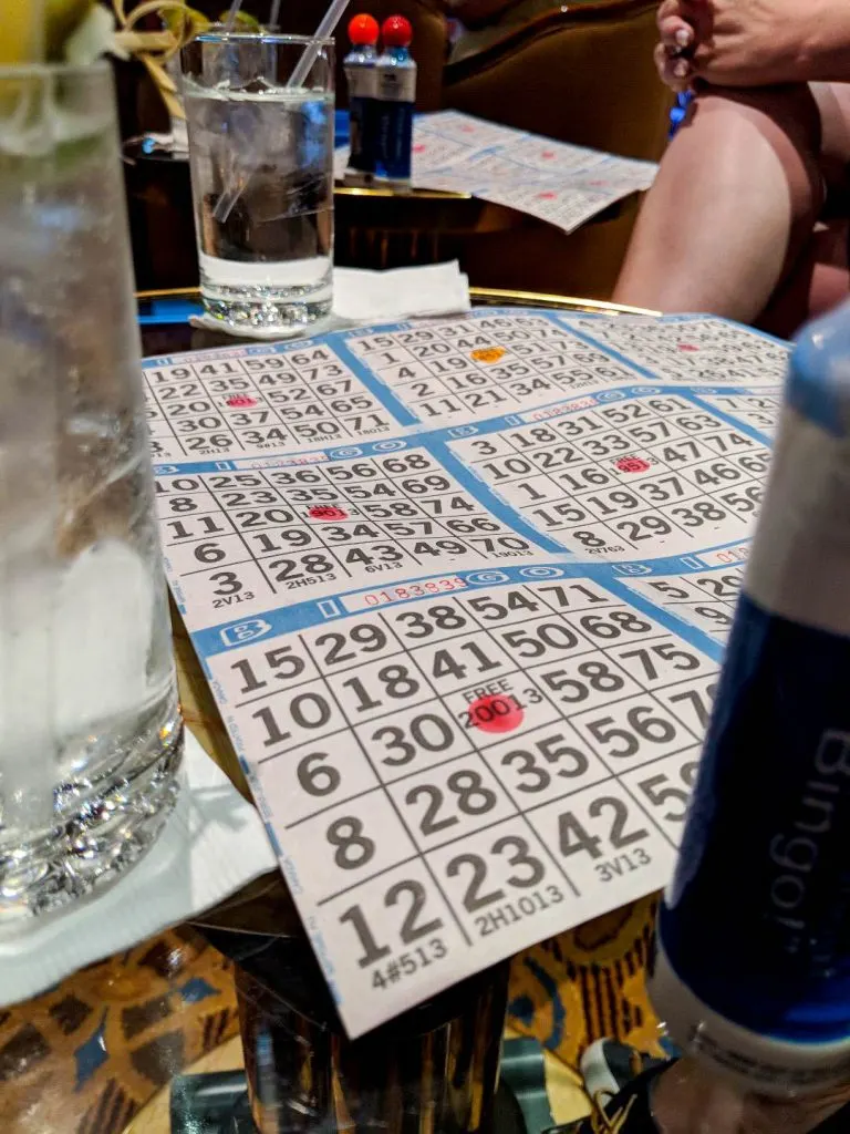 A person sitting at a table playing bingo