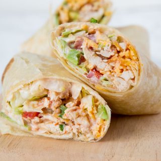 Crunchy Southwestern Chicken Wrap - easy lunch ideas are hard to come by. These chicken wraps come together in minutes, you can make them ahead, and the creamy spicy sauce makes them extra tasty!