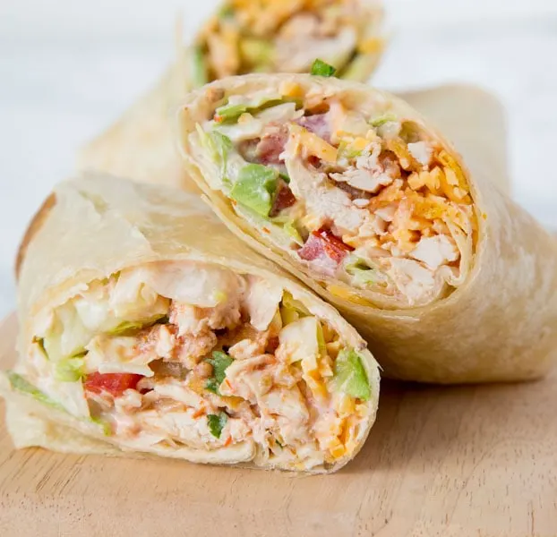 Crunchy Southwestern Chicken Wrap - easy lunch ideas are hard to come by. These chicken wraps come together in minutes, you can make them ahead, and the creamy spicy sauce makes them extra tasty!