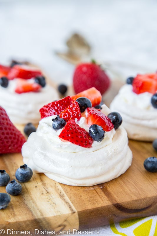 A close up of pavlova with berries