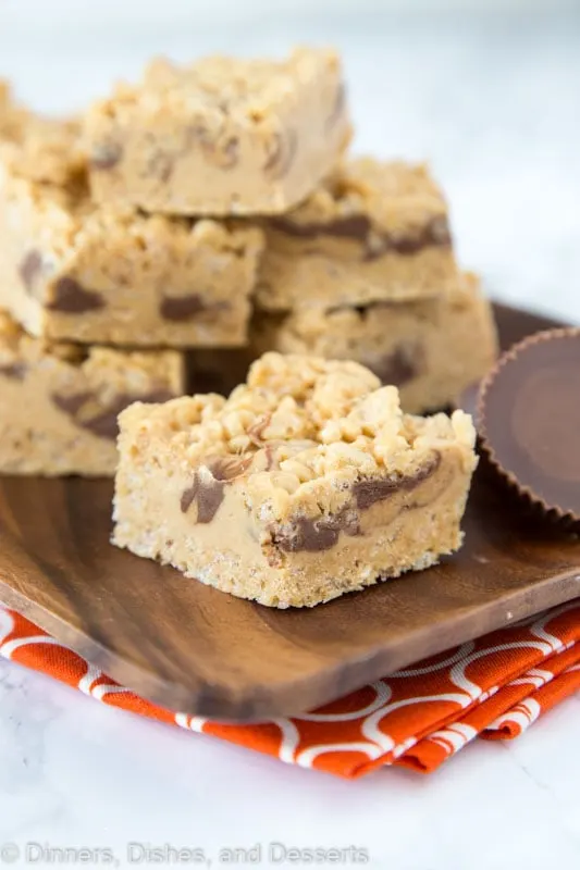 krispie treats with peanut butter and peanut butter cups on tray
