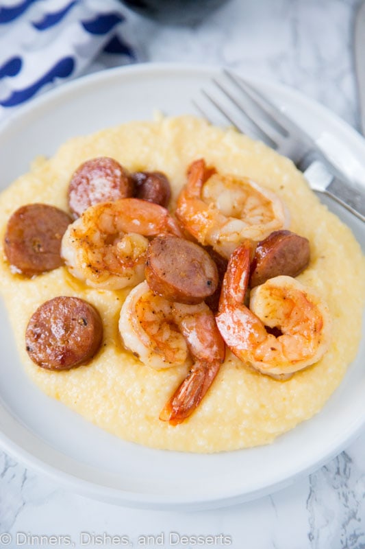 A plate of food, with Grits and Shrimp