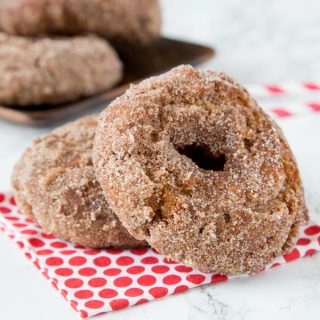 Apple Cider Donuts - fall is for apples, apple cider, and donuts!  These Apple Cider donuts are just like the ones at the orchard. Full of apple flavor and dusted with cinnamon and sugar. 