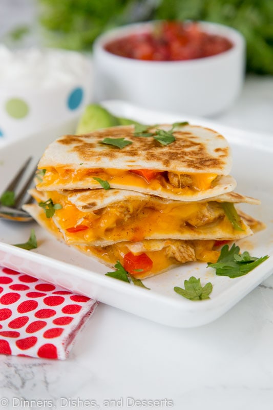 stacked quesadilla on a plate with Chicken and Fajita