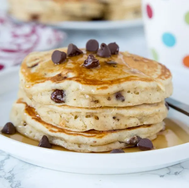 banana pancakes with chocolate chips stacked on a plate