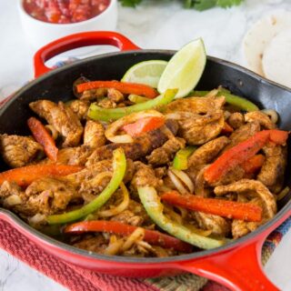 Easy Chicken Fajitas - skip going out and make chicken fajitas at home!  Super easy to make any night of the week, take your taco night to a whole new level!