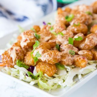 Bang Bang Shrimp Recipe - Crispy fried shrimp that is tossed in a sweet, spicy, and tangy sauce. The ultimate appetizer that will soon become your dinner! 