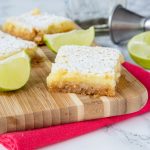 Margarita Bars Recipe - If you like classic lemon bars, you are going to love this lime bars spiked with tequila!  Everyone's favorite cocktail turned in to a creamy and delicious dessert!