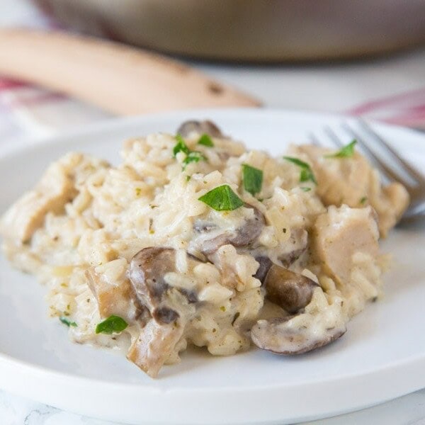 A plate of food with chicken and rice