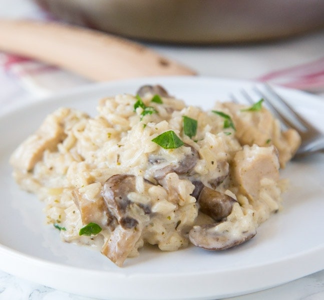 A plate of food with chicken and rice