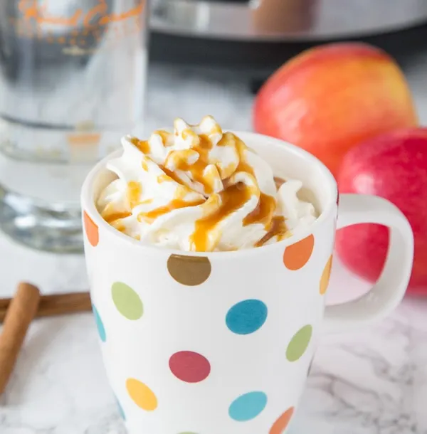 A close up of hot cider spiked with vodka