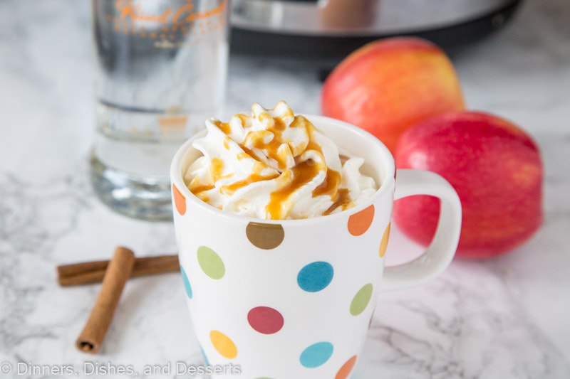 hot cider spiked with vodka topped with whipped cream