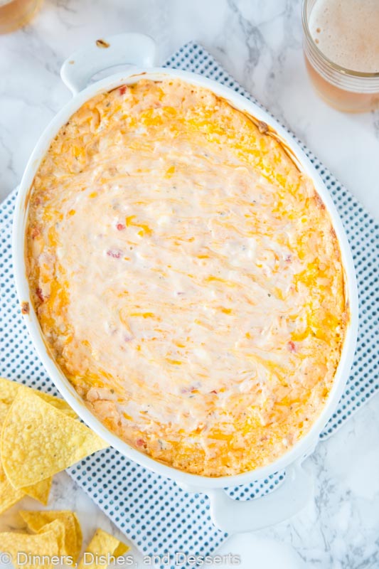 baked cheese dip in a dish with chips