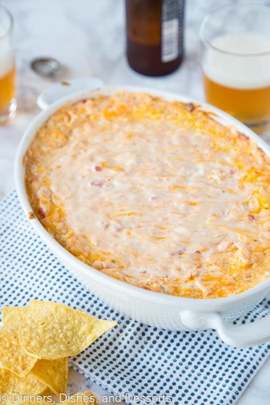 baked cheese dip in a dish with chips