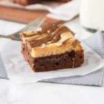 Peanut Butter Cheesecake Brownies - rich and fudgy brownies with a layer of creamy peanut butter cheesecake and topped with even more chocolate!  A dessert lovers dream! 