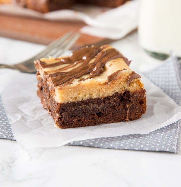Peanut Butter Cheesecake Brownies - rich and fudgy brownies with a layer of creamy peanut butter cheesecake and topped with even more chocolate!  A dessert lovers dream! 
