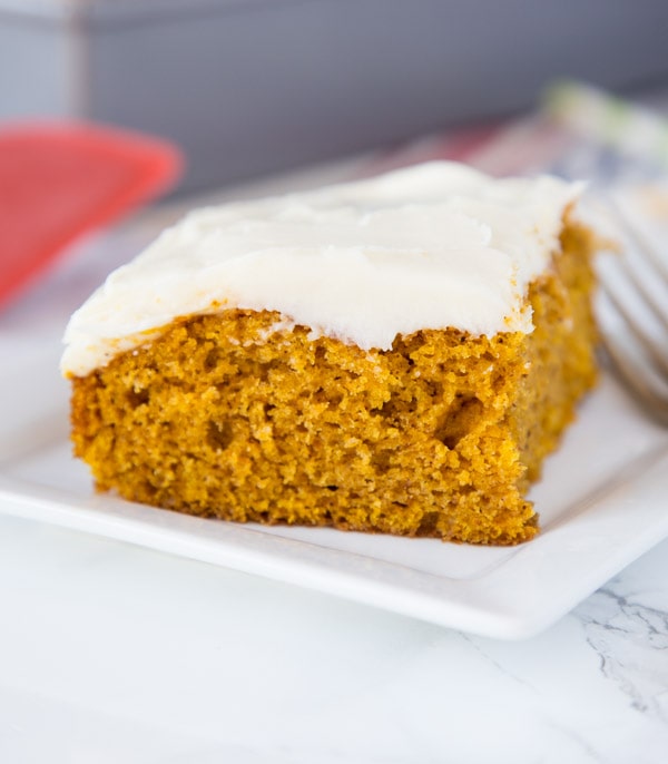 Pumpkin Bars - Light and fluffy pumpkin bars with all those delicious fall spices.  Topped with homemade cream cheese frosting for a delicious pumpkin dessert!