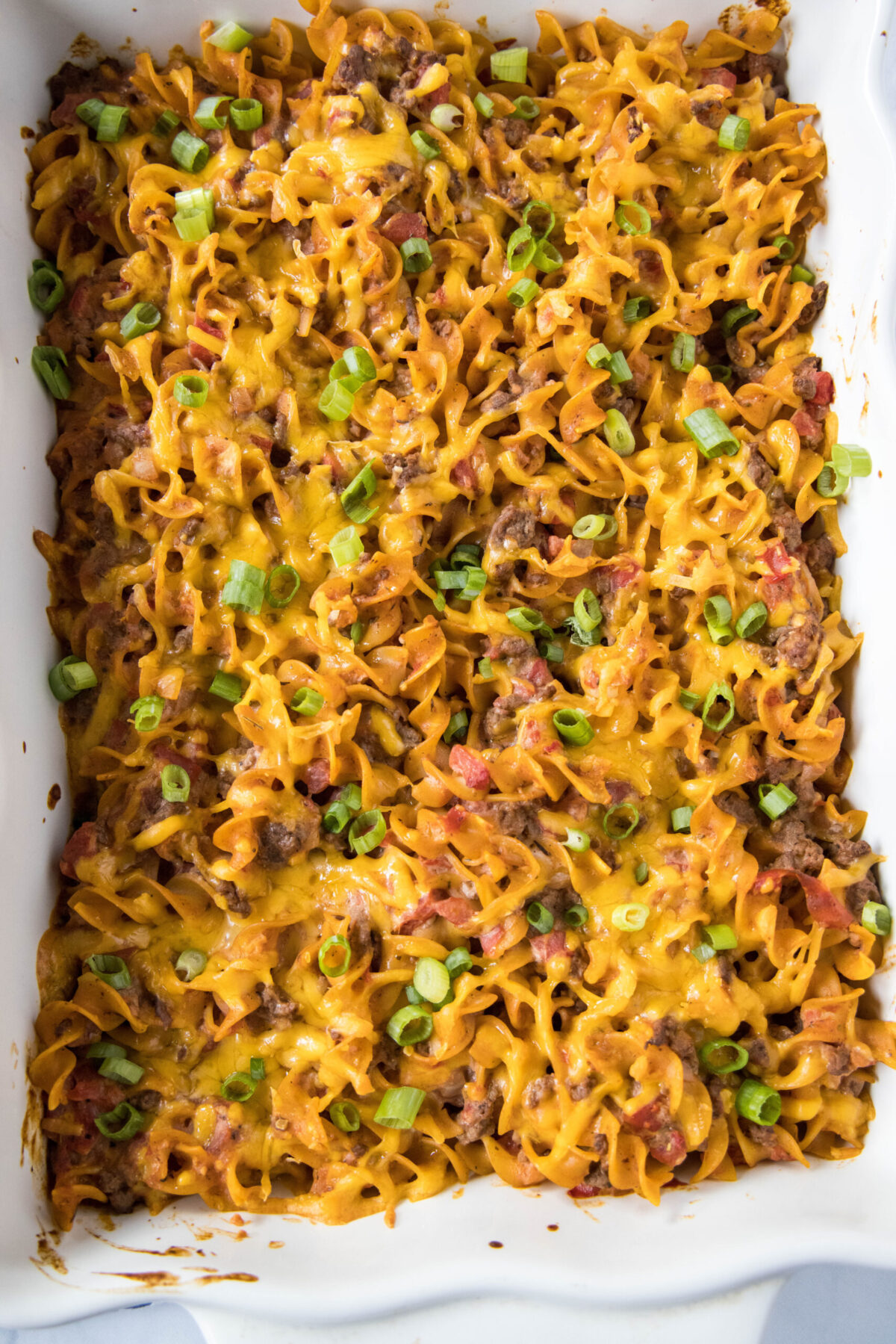 Overhead view of a casserole dish full of beef noodle casserole