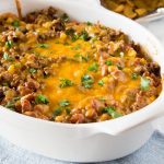 Frito Pie Recipe - a Frito taco pie recipe that is great for busy weeknights. Delicious comfort food that the whole family love. 