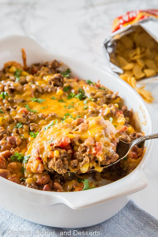 Frito Pie Recipe - a Frito taco pie recipe that is great for busy weeknights. Delicious comfort food that the whole family love. 