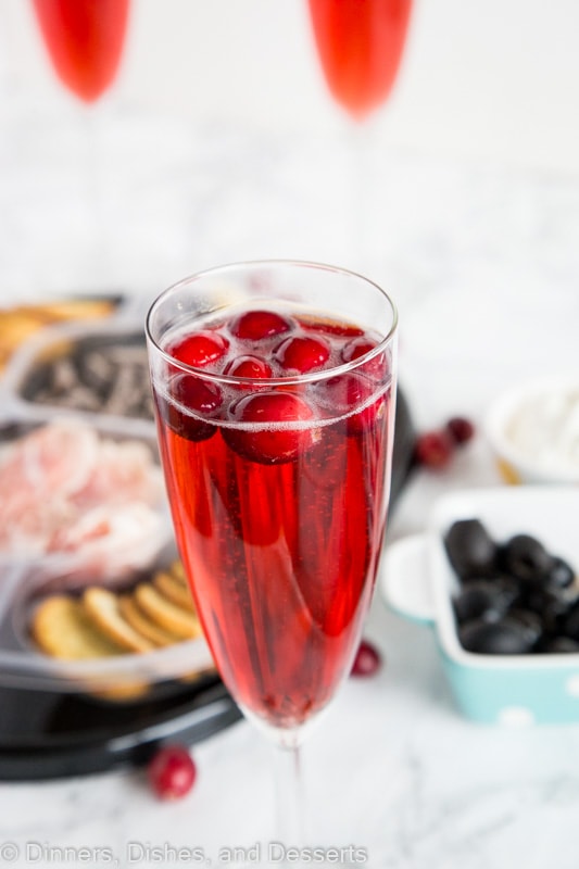 A close up of a wine glass, with Mimosa and Dinner