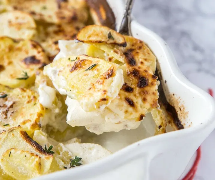 Scalloped Potato Recipe - these scalloped potatoes are so creamy and delicious. Full of fresh herbs for a great side dish for even your best meal!  