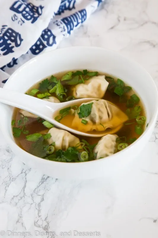 A bowl of soup, with Dinner and Wonton