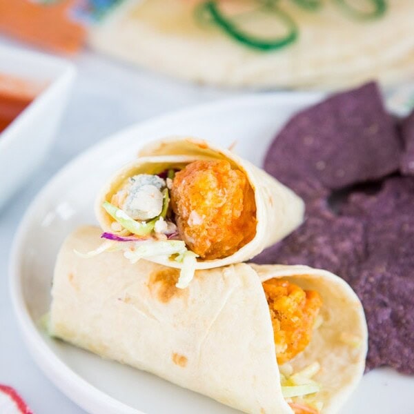 A piece of food on a plate, with Chicken and Wrap
