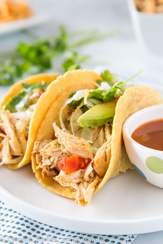 chicken in tortillas on a plate