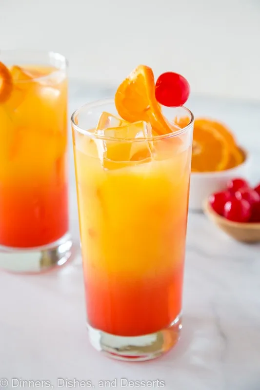 tequila sunrise with oranges and cherries