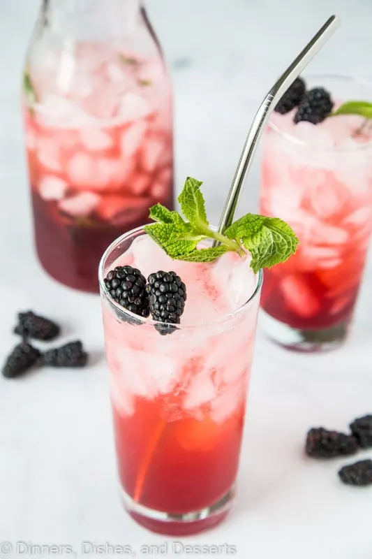 Blackberry Mint Lime Punch with pitcher of punch in background