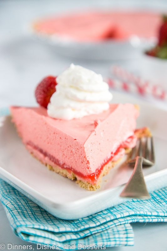 Easy no bake jello pie using strawberry jello. Topped with whipped cream and strawberries