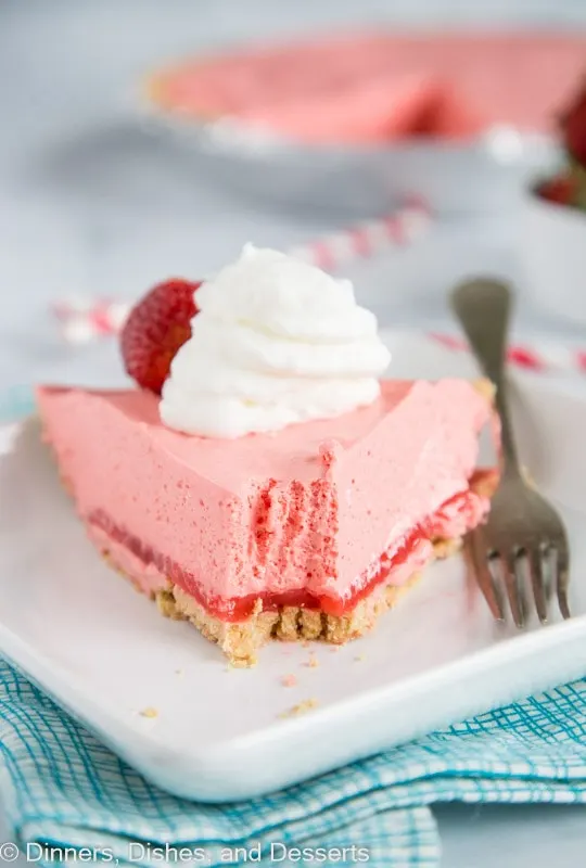 No bake pie with strawberry jello, cool whip, and a graham cracker crust