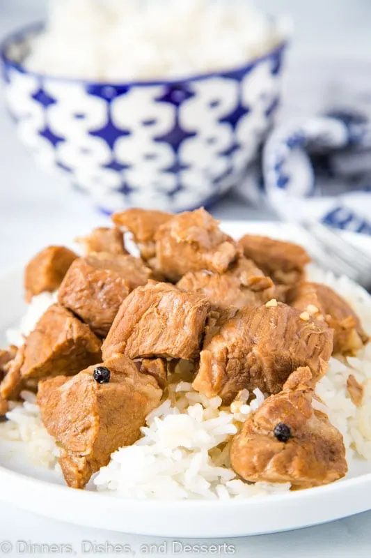 Super tender chunks of pork cooked in soy sauce, vinegar, garlic, and peppercorns is Filipino style Pork Adobo