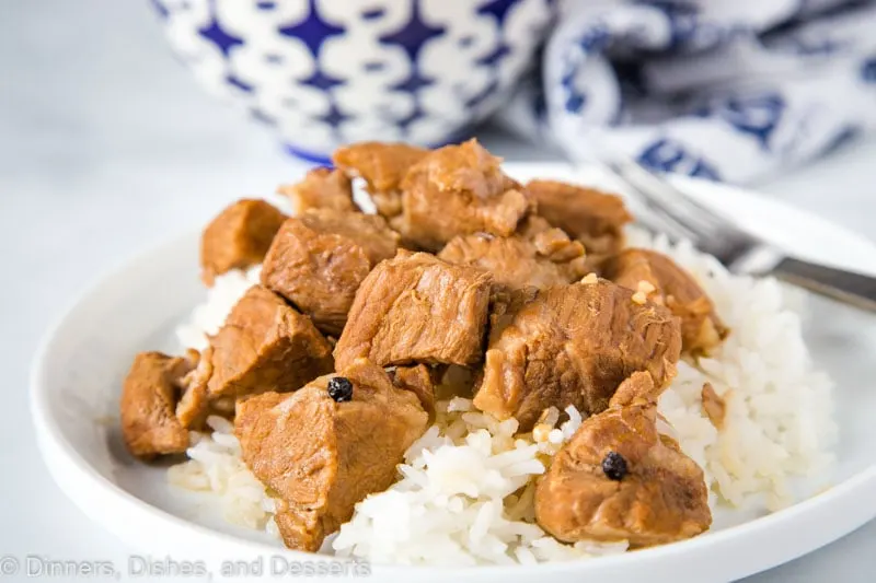 A plate of food with rice and meat