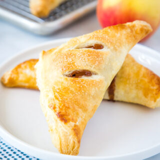 A piece apple turnover on a plate