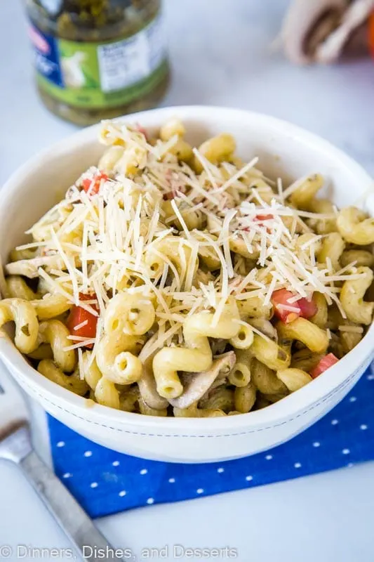 A bowl of pasta topped with cheese