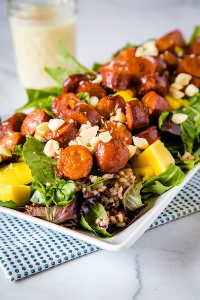 A plate of food on a table, with Dinner and Salad