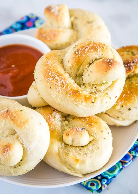 Garlic Knots that are easy to make and coated in a delicious butter garlic sauce