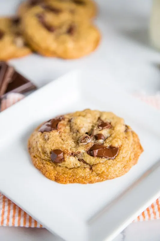 A close up of a cookie on a plate, with Cookie and Chocolate